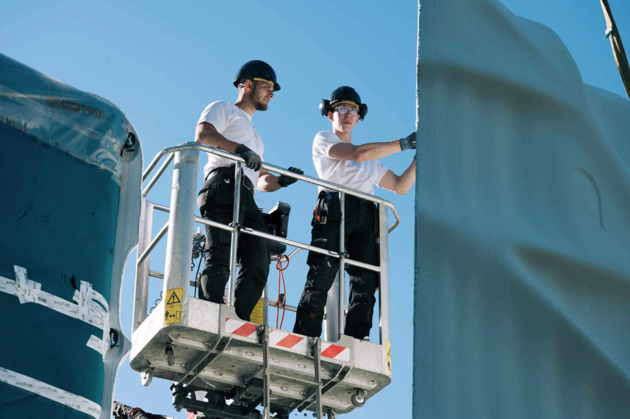 Inspecting the habitat on a crane.