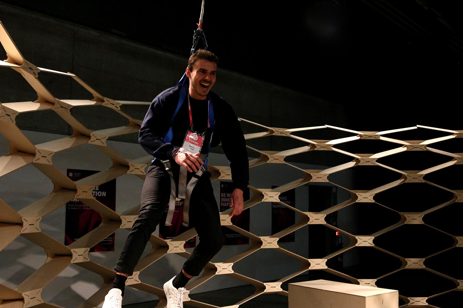 A man smiling while trying the gravity pavilion.