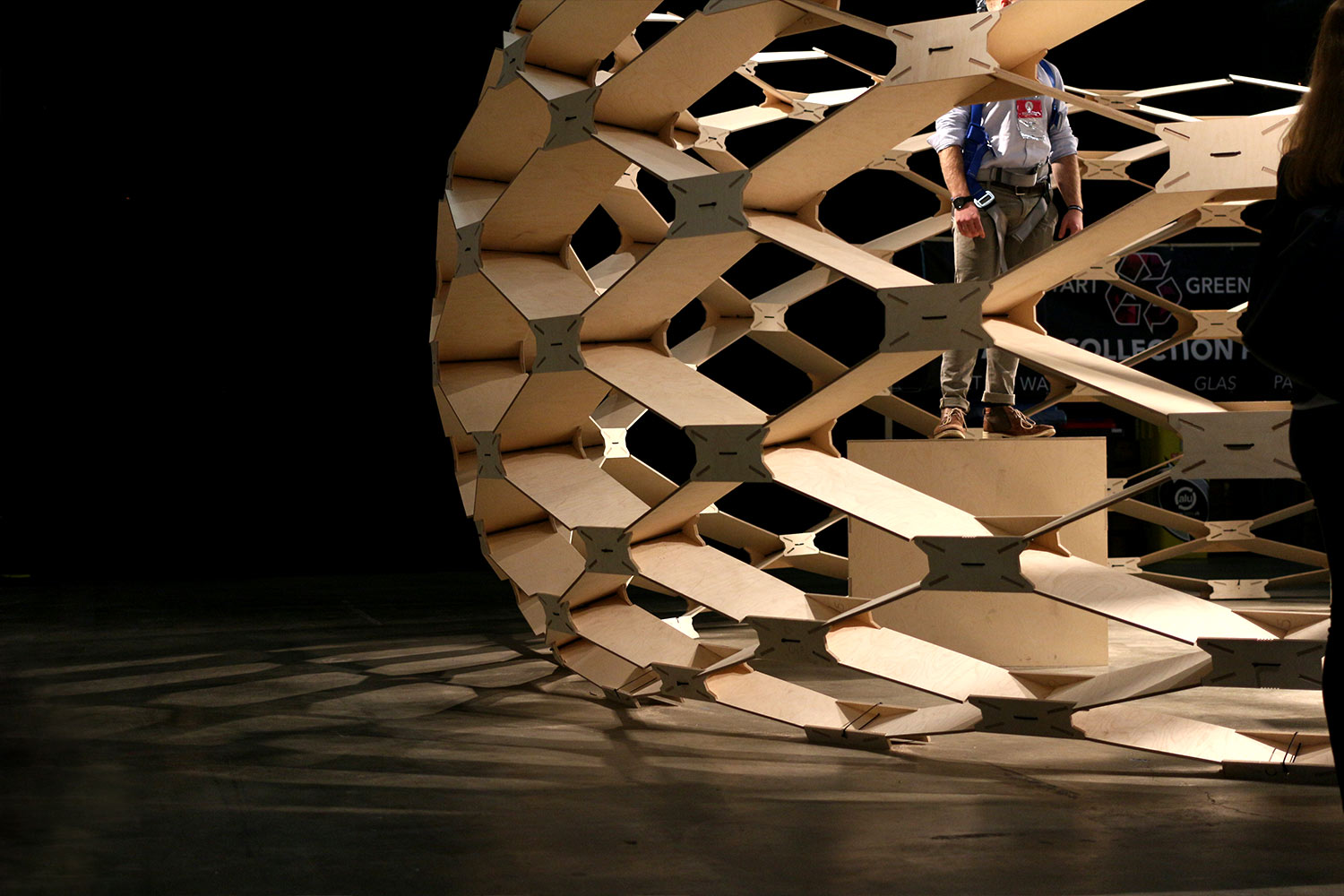 A man standing on a stair block while trying the gravity pavilion.